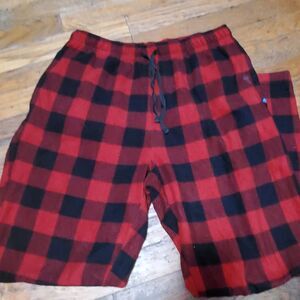 A pair of rainforest classic red and black plaid flannel pajama pants size small